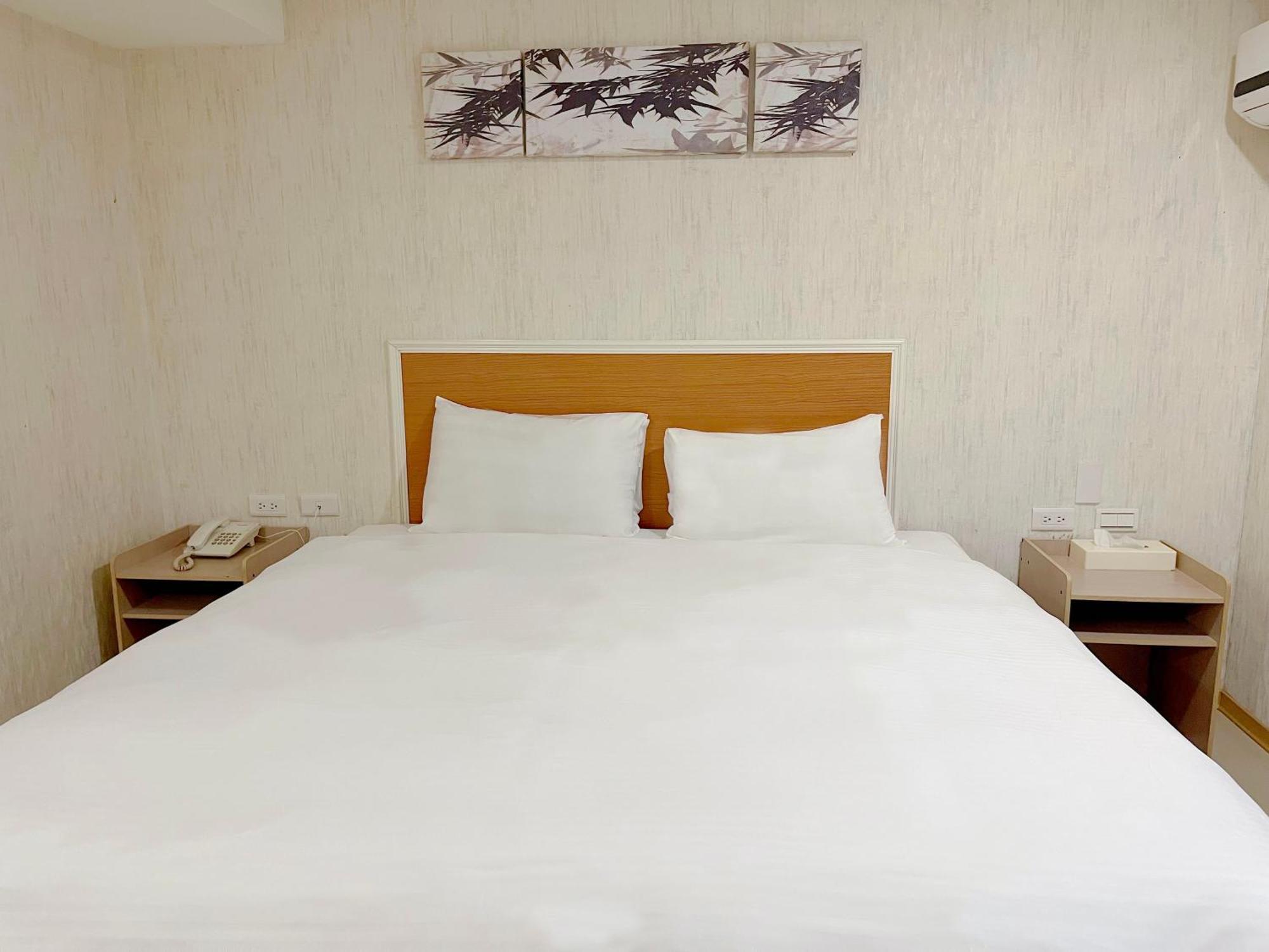 E Lim Hotel Zhongli Kamer foto