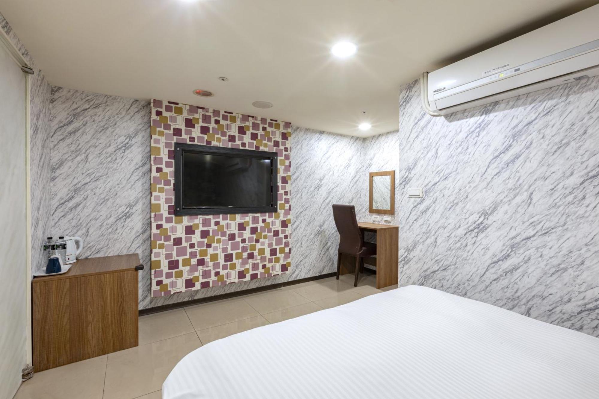 E Lim Hotel Zhongli Kamer foto
